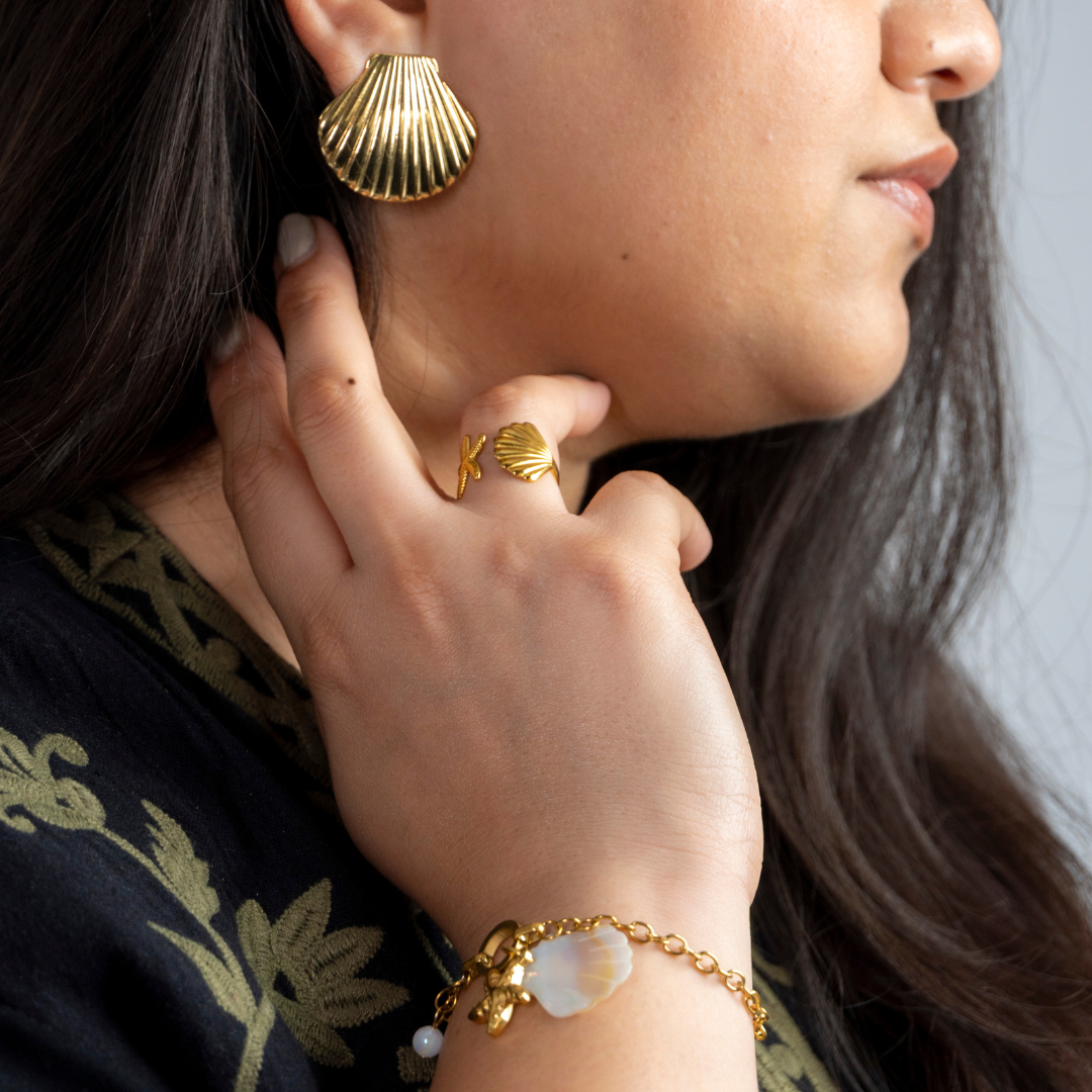 The Coastline Whispers shell studs