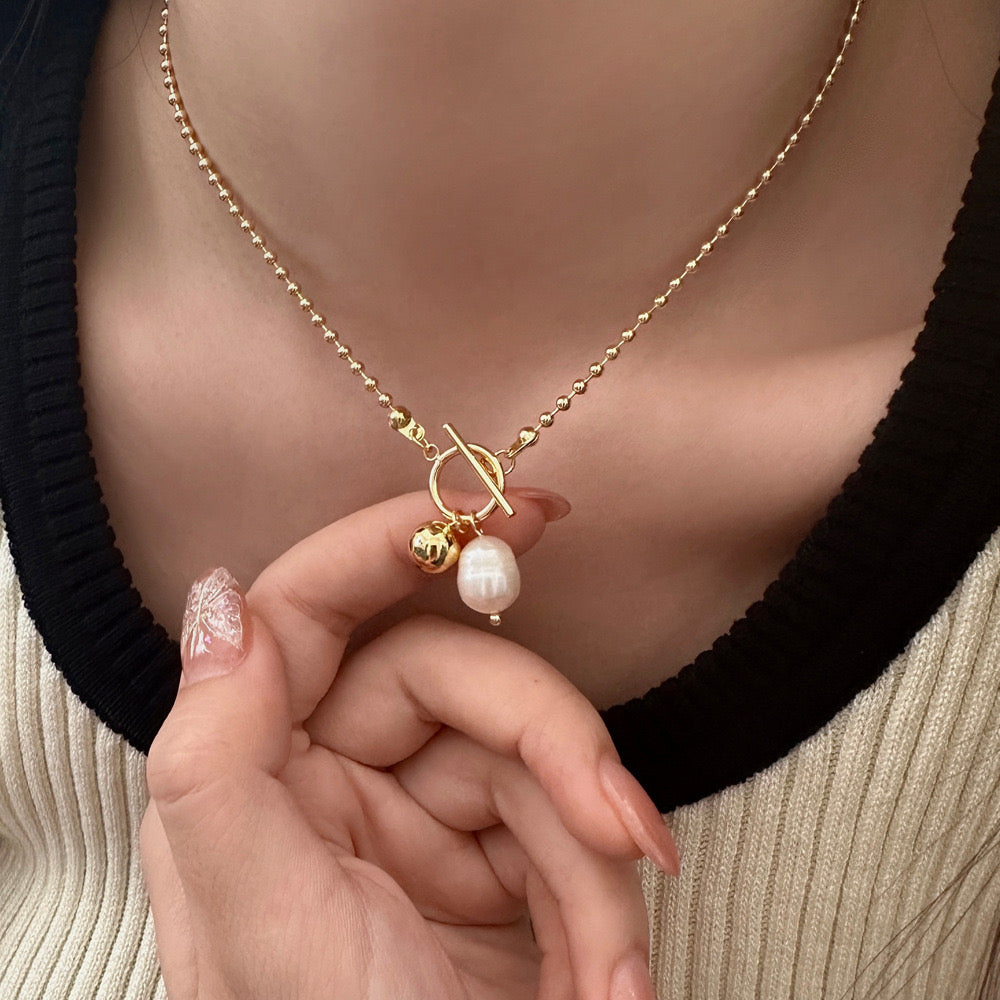 The Soft Escape pearl charms necklace