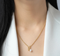The Soft Escape pearl charms necklace